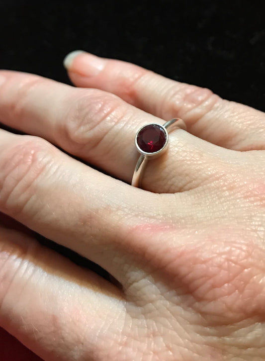 Handmade, Sterling silver birthstone ring with garnet stone.  Price may vary by stone.   CUSTOM ORDER