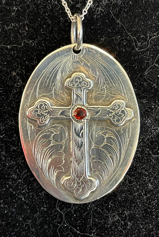 Handmade, hand engraved, Sterling silver pendant with Garnet stone.  Price may vary by stone.   CUSTOM ORDER 