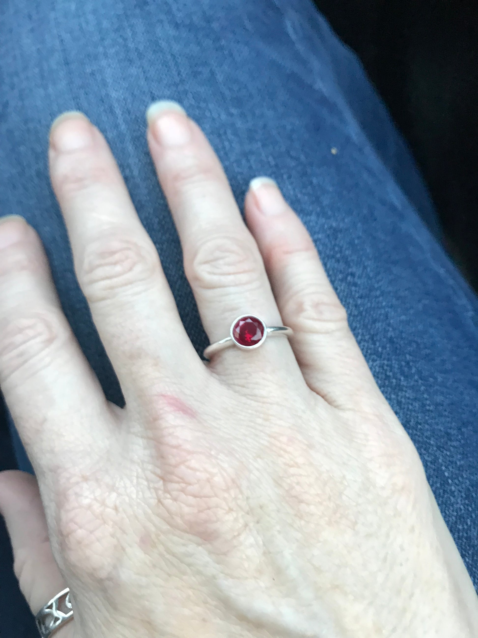 Handmade, Sterling silver birthstone ring with garnet stone.  Price may vary by stone.   CUSTOM ORDER