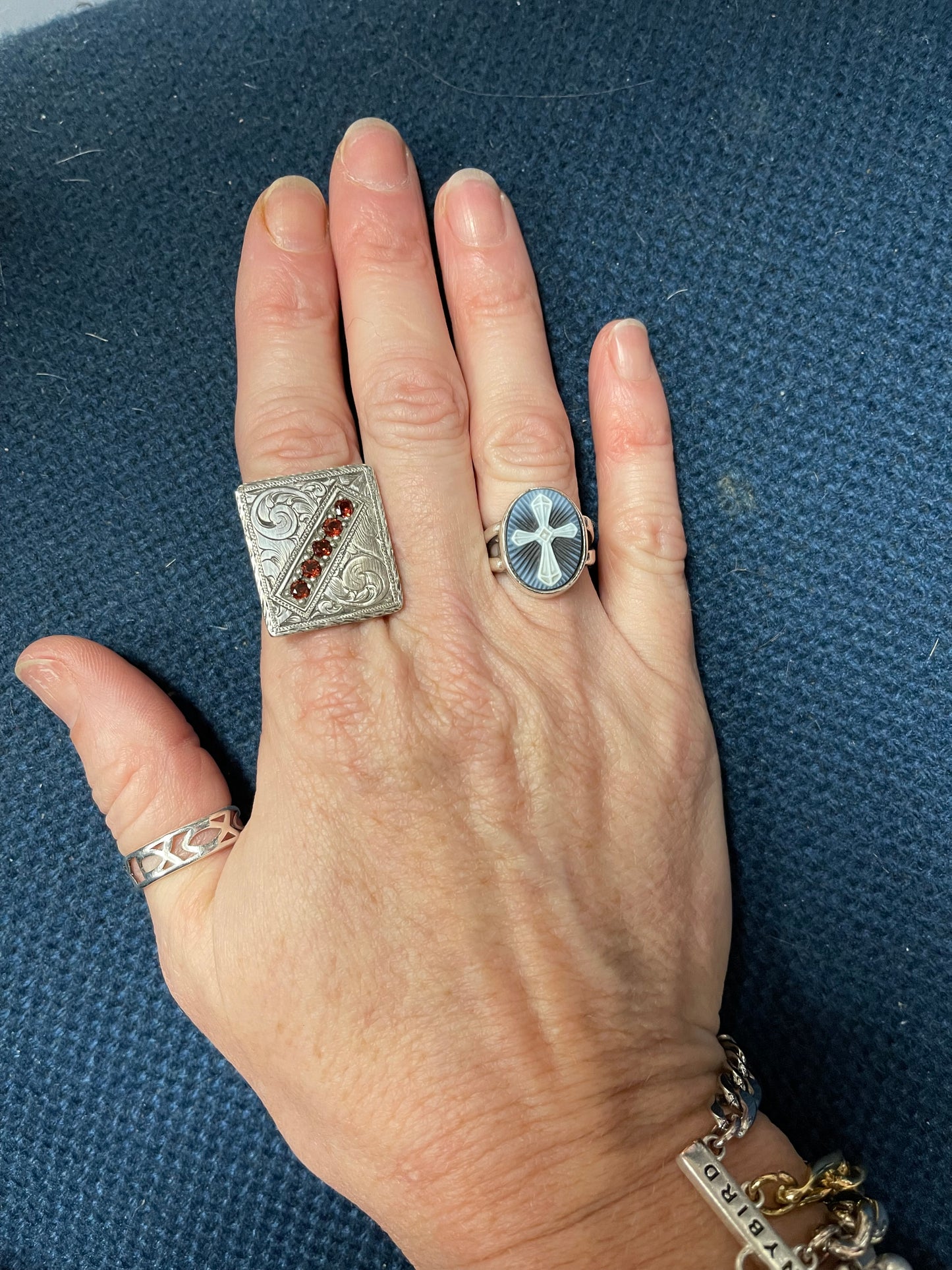 Hand engraved, Sterling silver, Flat Top Ring with 5 garnet stones.  Price may vary by stone.