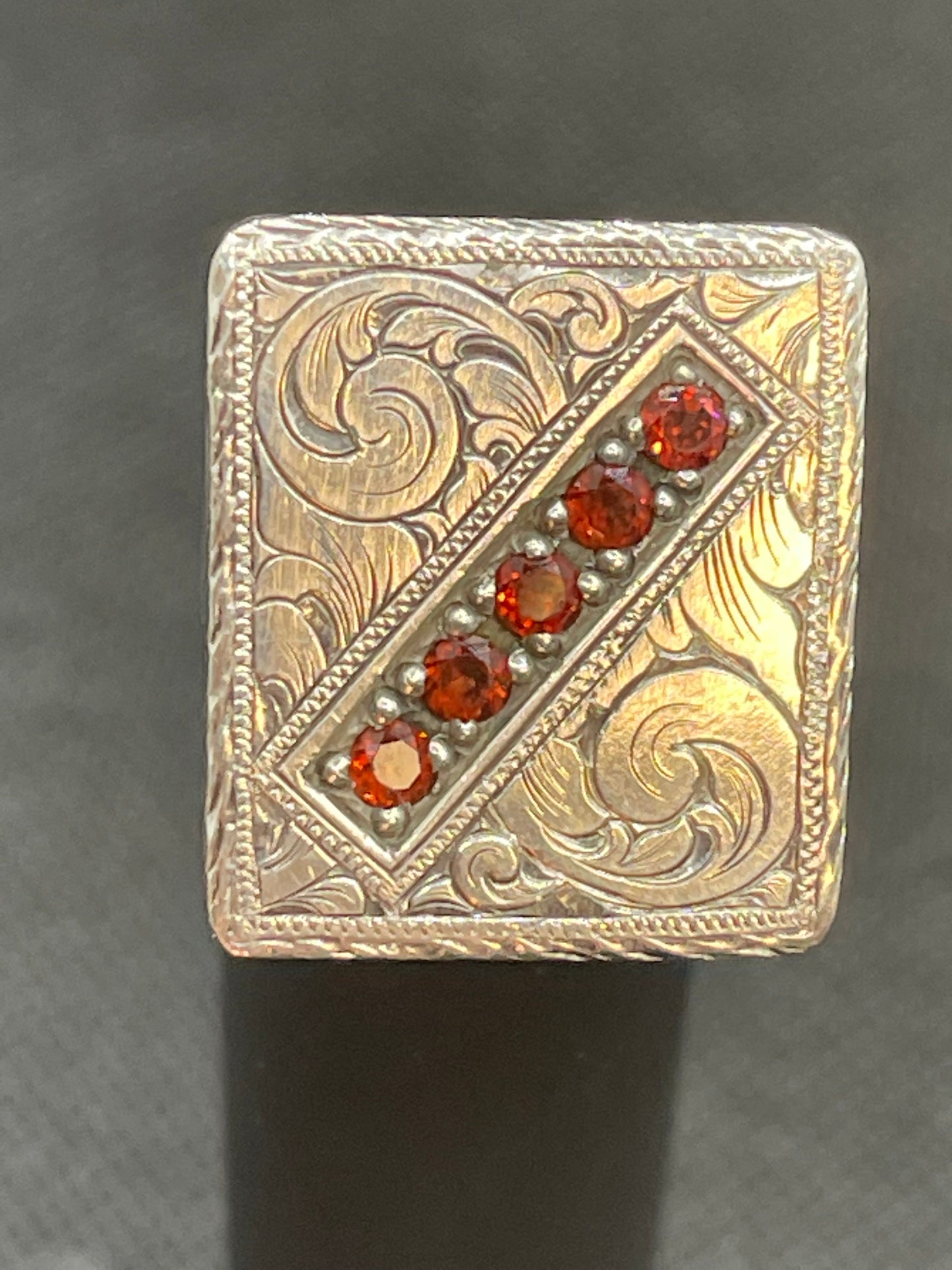 Hand engraved, Sterling silver, Flat Top Ring with 5 garnet stones.  Price may vary by stone.