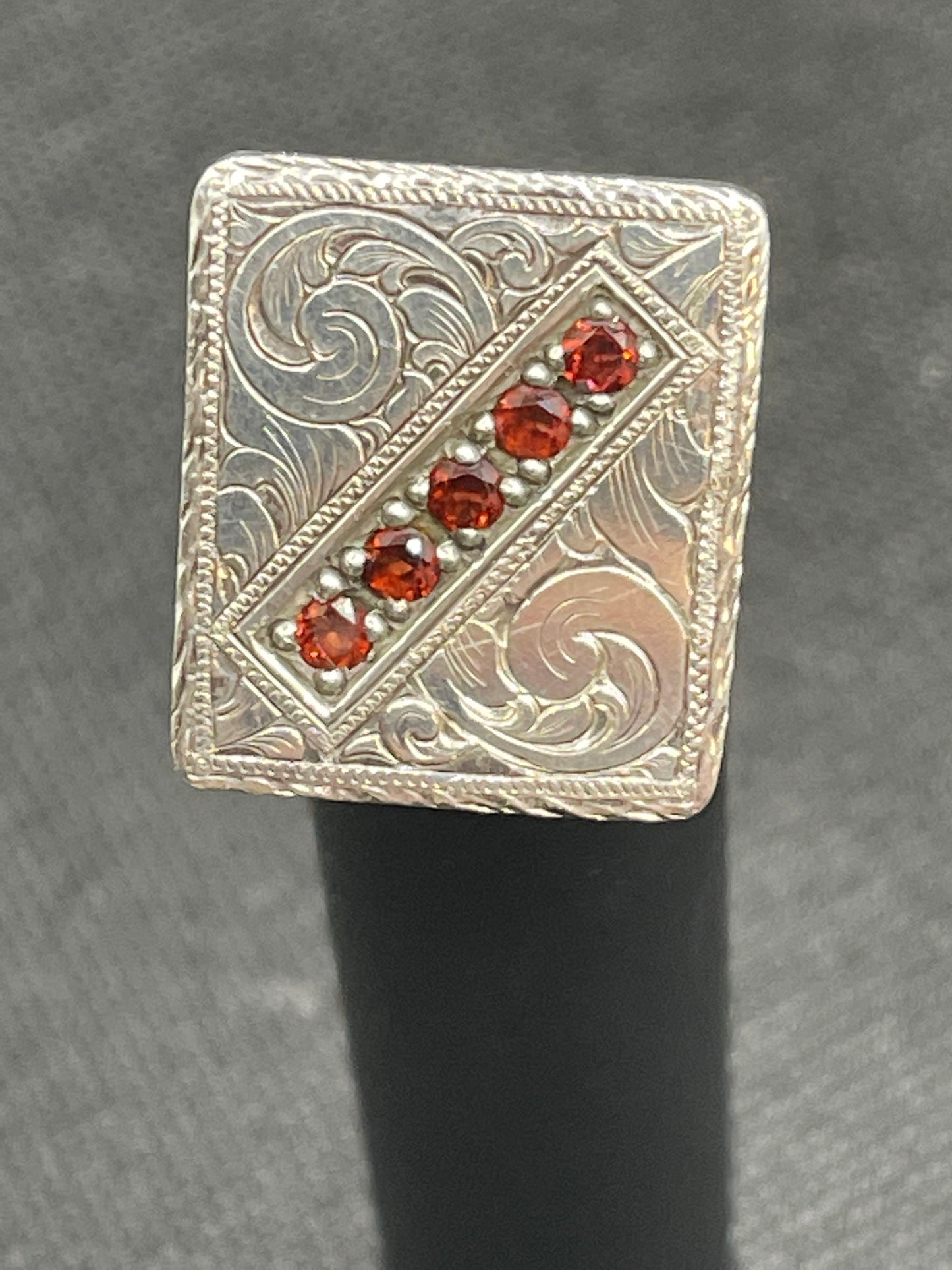 Hand engraved, Sterling silver, Flat Top Ring with 5 garnet stones.  Price may vary by stone.