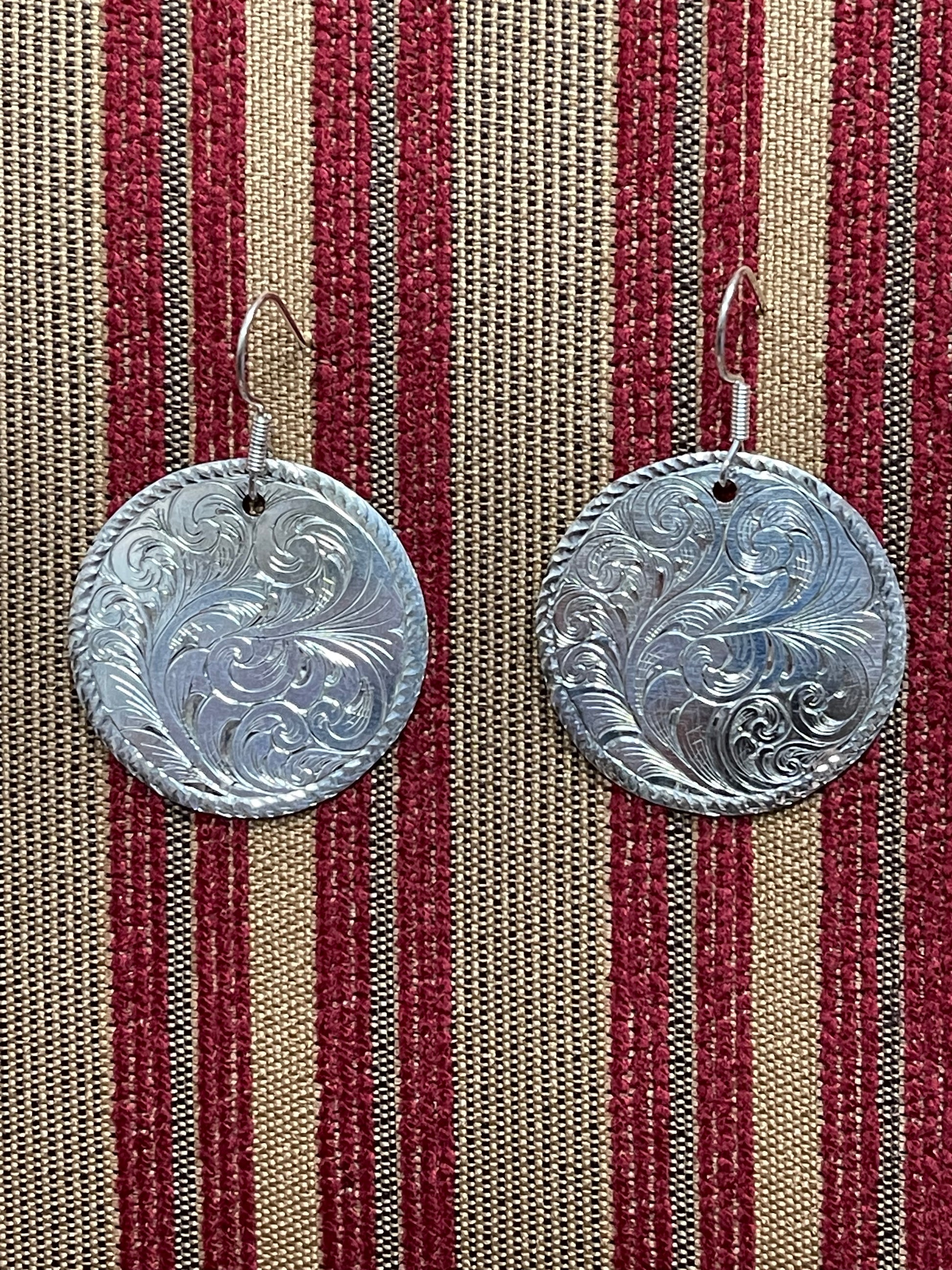 Handmade, hand engraved Sterling silver earrings.   Size varies by client specifications.  CUSTOM ORDER